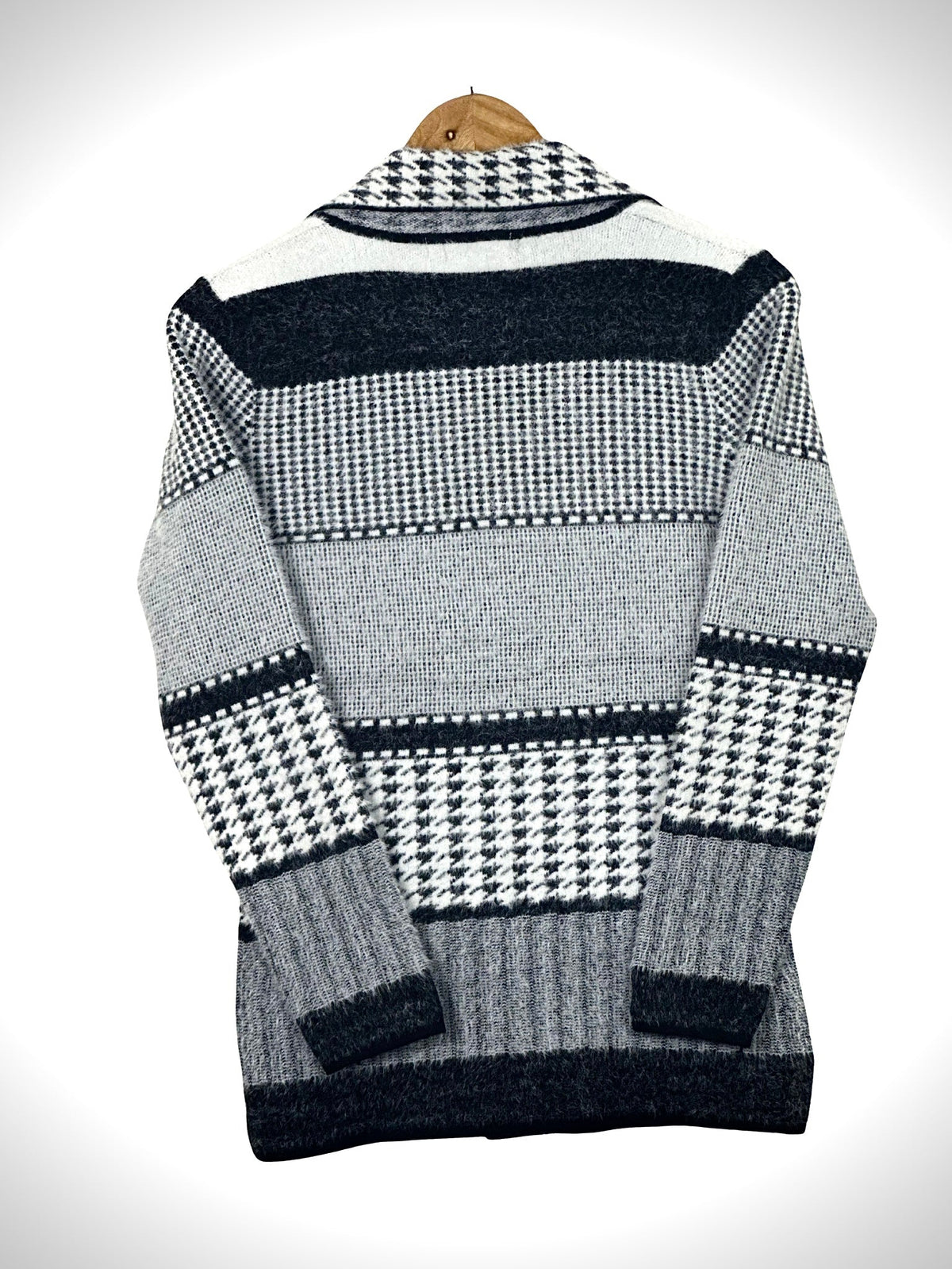 Cozy&Drape short cardigan sweater coat featuring a black and white houndstooth and striped knit pattern