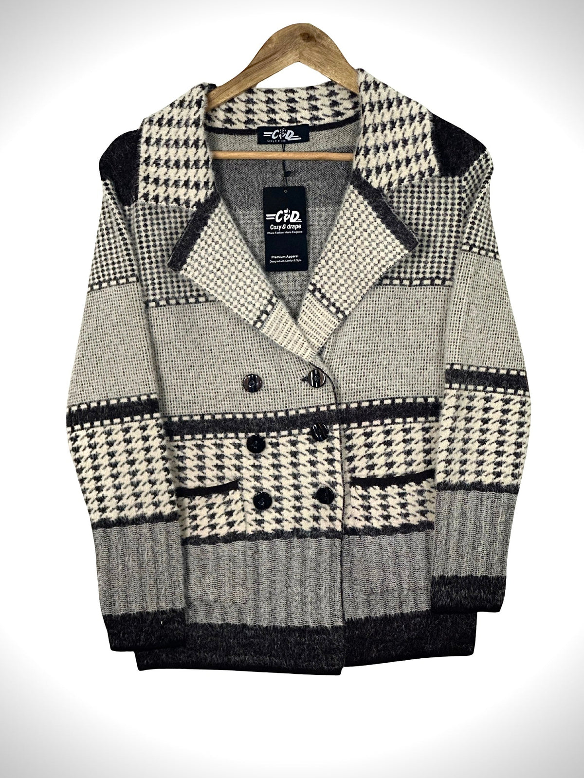 Cozy&Drape short cardigan sweater coat in a black and white houndstooth pattern with double-breasted button closure.