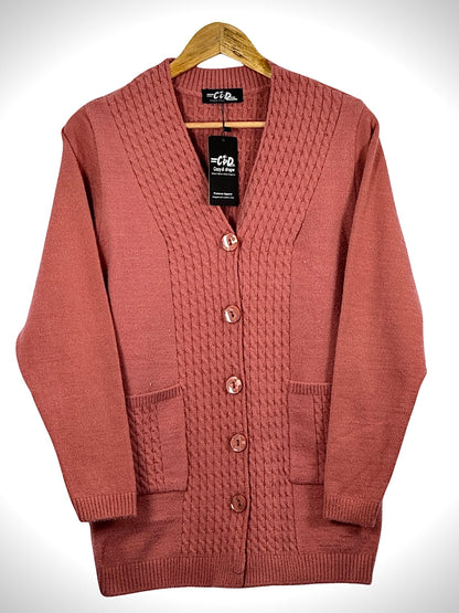 Cozy&Drape long cardigan sweater in dusty rose with cable knit detailing, front buttons, and two patch pockets.