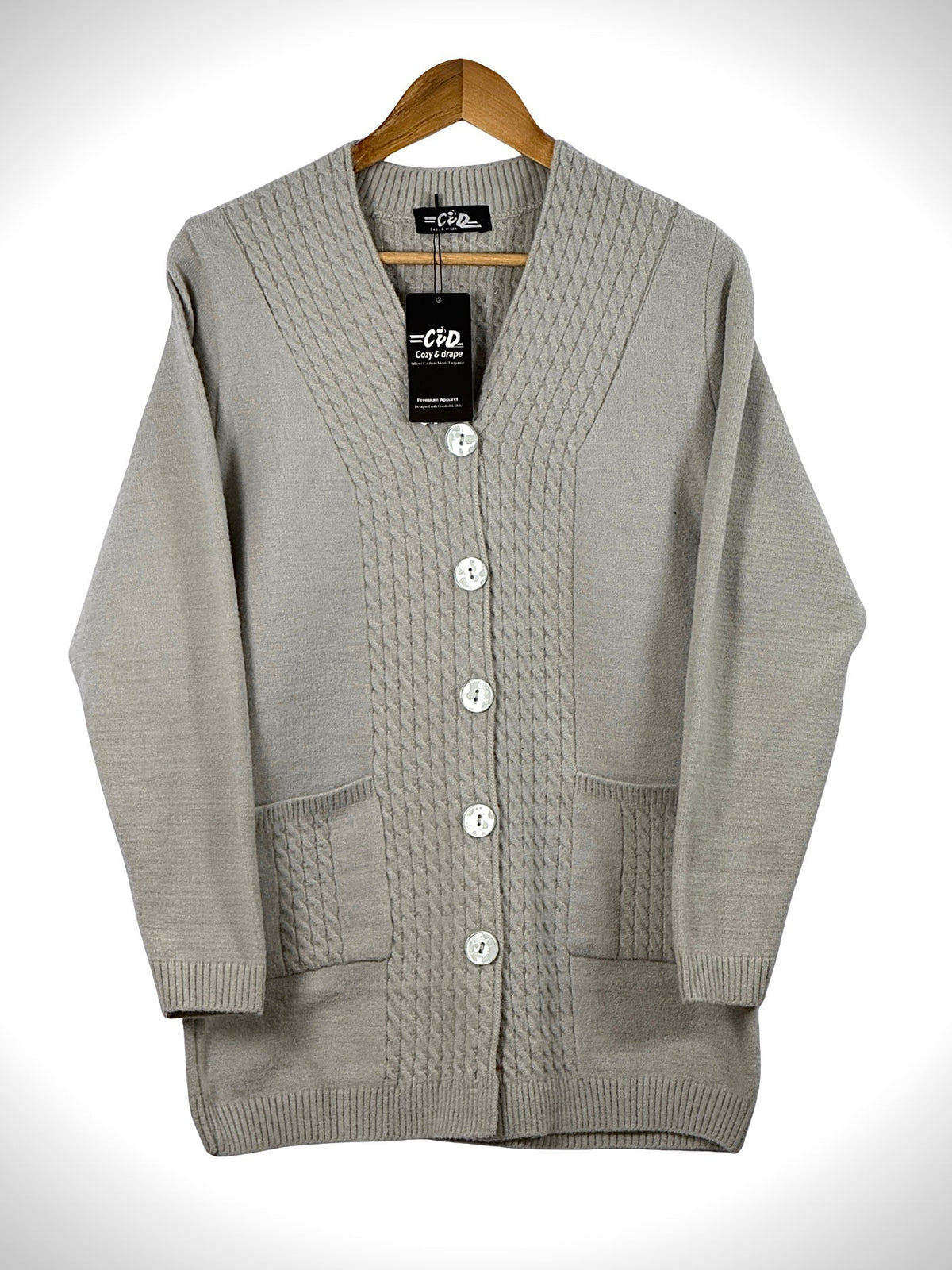 Cozy&Drape long grey knit cardigan sweater with front buttons, cable knit details, and two convenient pockets.