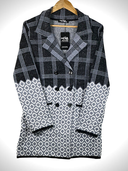 Cozy&Drape long cardigan sweater coat featuring a black and grey plaid top and geometric patterned bottom