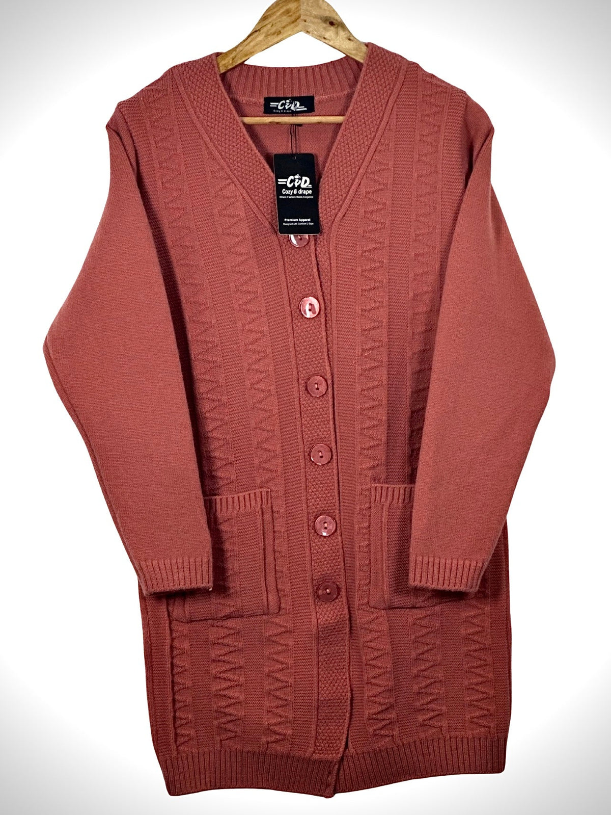 Cozy&Drape long sleeve button front cardigan in dusty rose with a textured knit pattern and two front pockets.