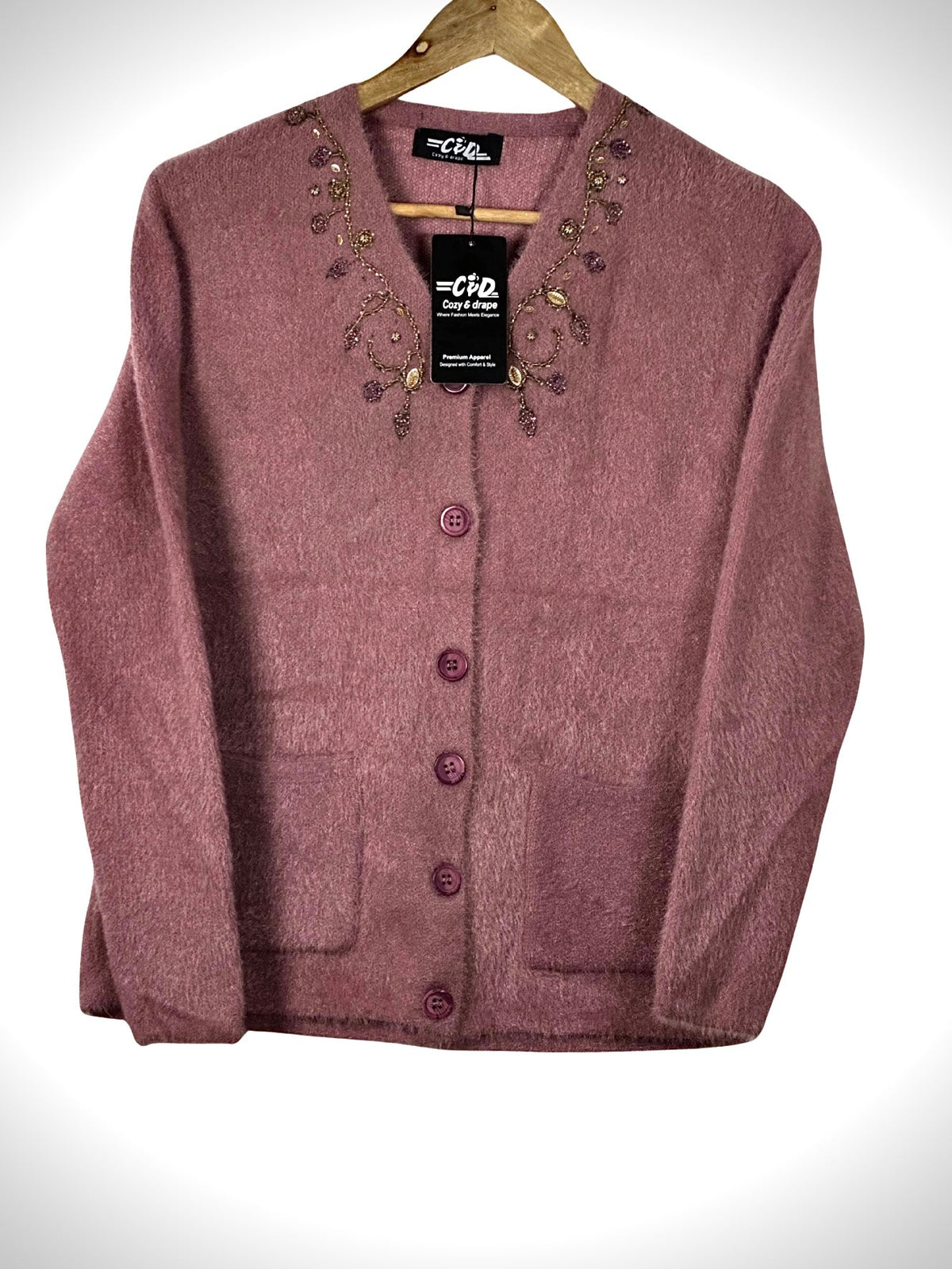 Cozy&Drape mauve full-sleeve cardigan sweater with front buttons, pockets, and decorative beaded neckline detail.