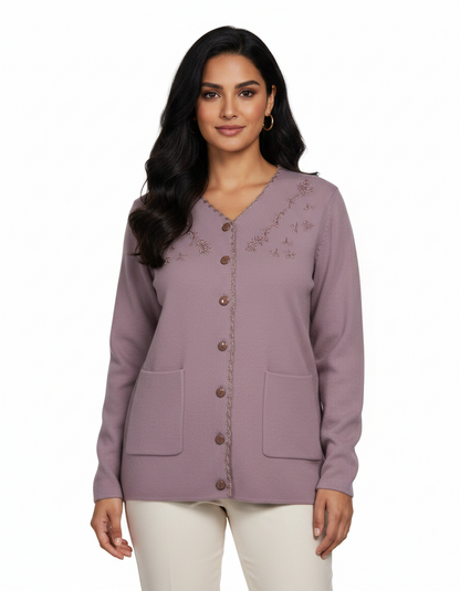 Cozy&Drape mauve knit cardigan with V-neck, floral embroidery, button-down front, and pockets worn by a model