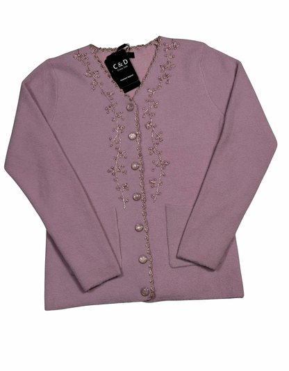 Cozy&Drape mauve knit cardigan with V-neck, floral embroidery along the button placket, and two front pockets.