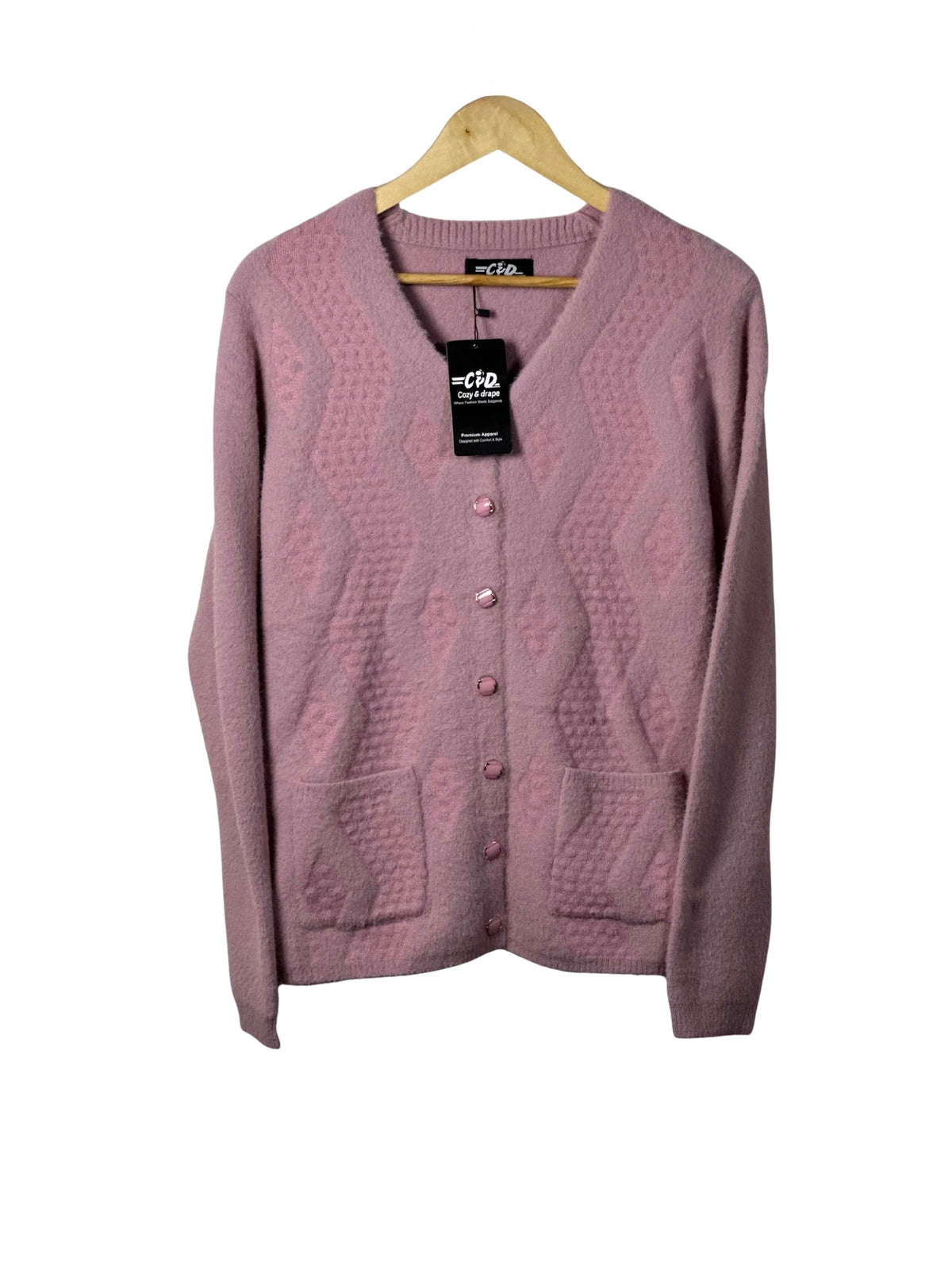 Cozy&Drape mauve pink button-up cardigan sweater with a textured diamond pattern and two front pockets on a hanger
