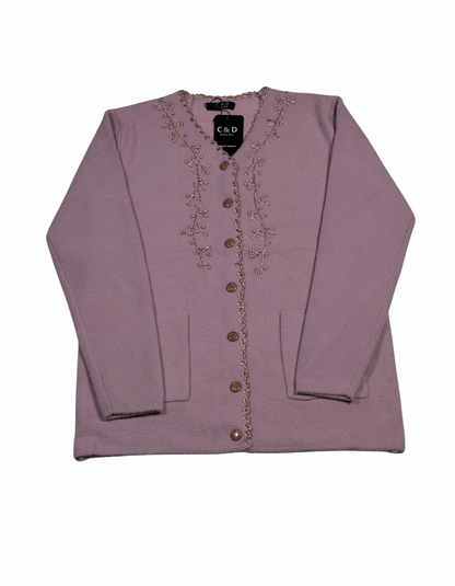 Cozy&Drape mauve wool cardigan with button front, long sleeves, front pockets, and delicate floral embroidery detail.
