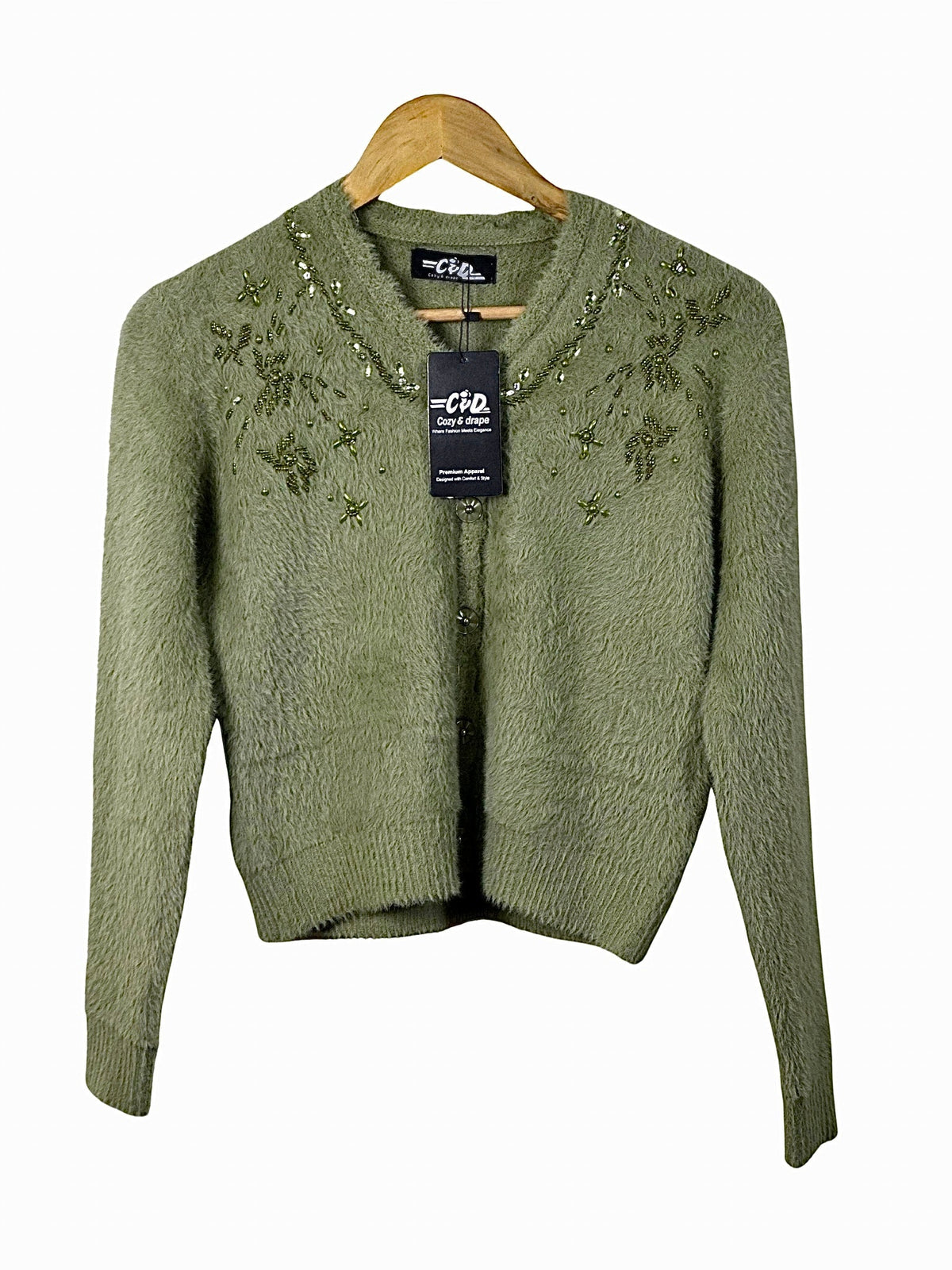 Cozy&Drape olive green extra short cardigan sweater with delicate beaded floral embroidery on a wooden hanger