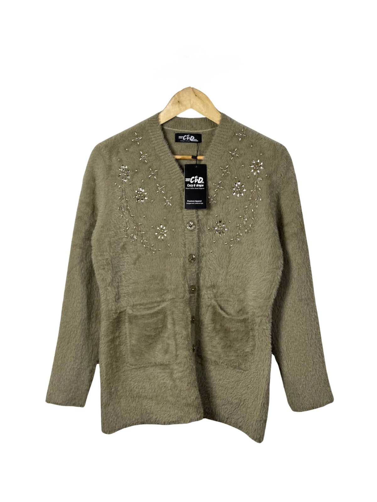 Cozy&Drape olive green fuzzy cardigan sweater with floral beadwork, front pockets, and button closure on a hanger.
