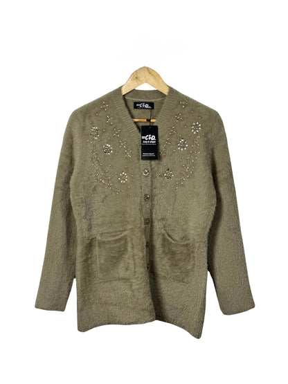 Cozy&Drape olive green fuzzy cardigan sweater with floral beadwork, front pockets, and button closure on a hanger.