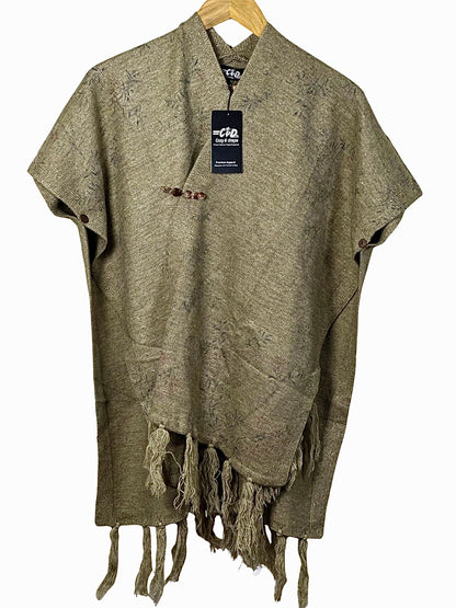 Cozy&Drape cape shawl in olive green with textured fabric, button closure, and decorative fringe hem for winter.