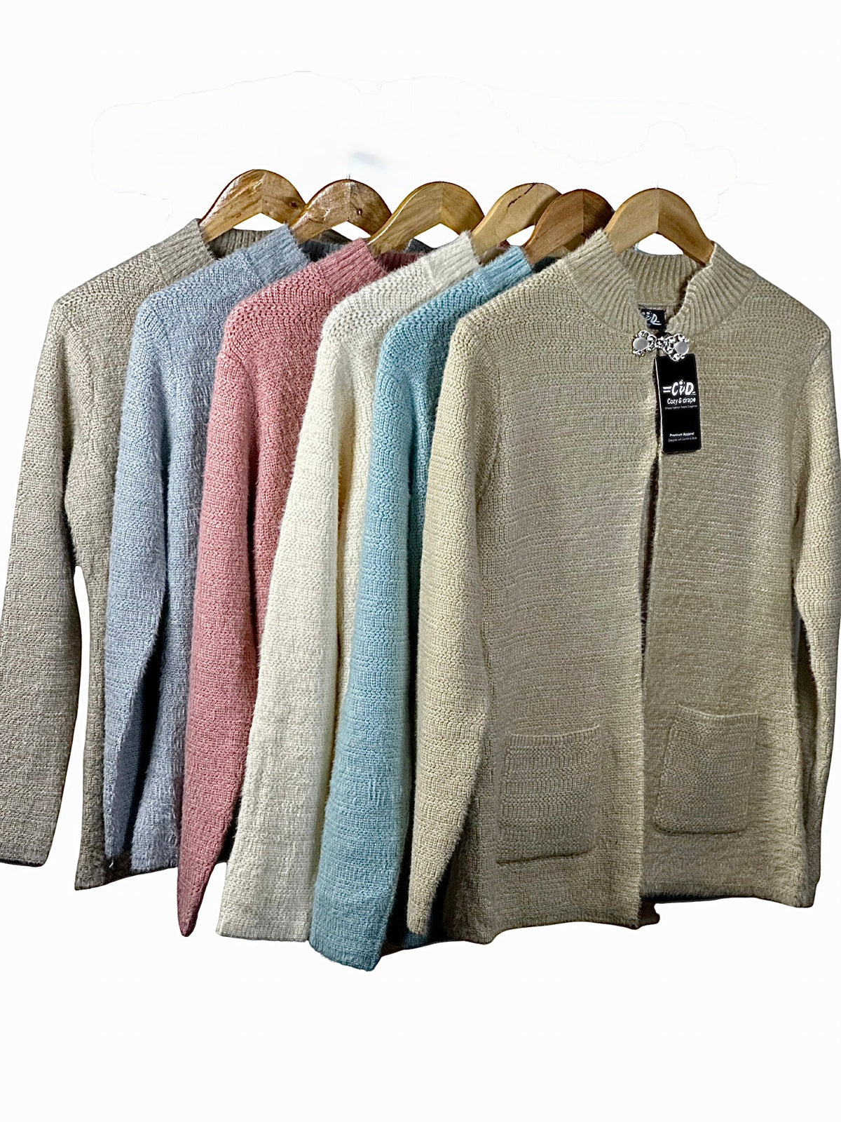 Cozy&Drape regular fit full sleeve cardigan sweaters in assorted pastel colors with front pockets on wooden hangers