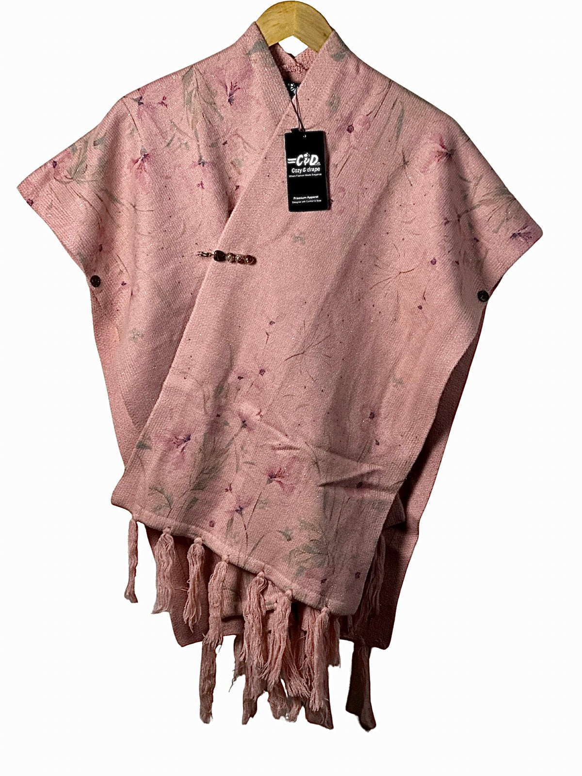 Cozy&Drape pink floral cape shawl with tassel fringe and button closure for elegant winter layering.