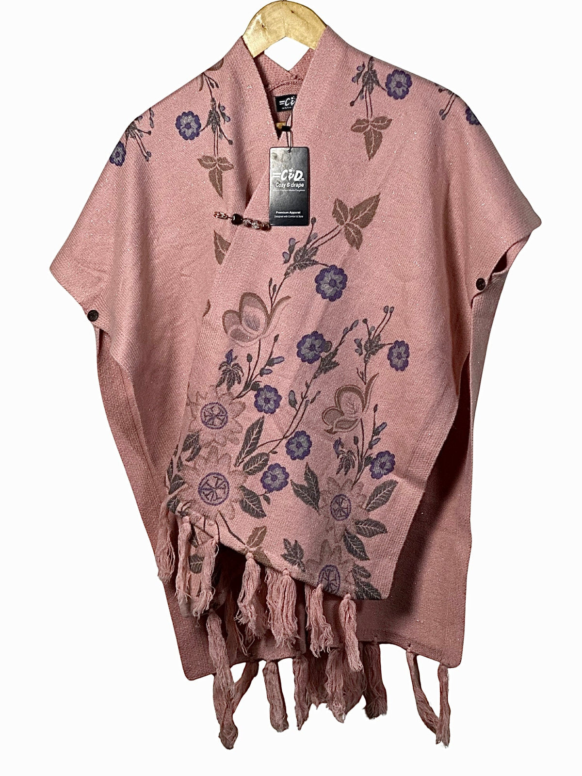 Cozy&Drape pink floral cape shawl with fringe hem and button closure, perfect for winter layering.