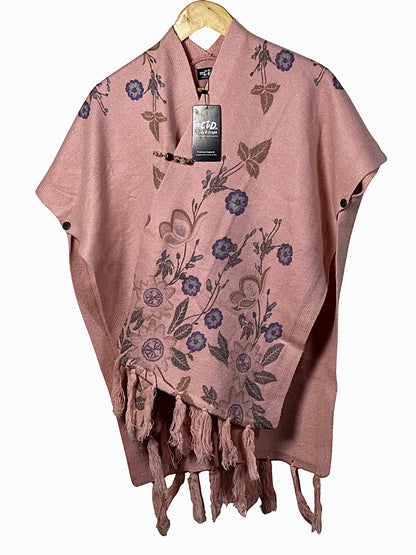 Cozy&Drape pink floral cape shawl with fringe hem and button closure, perfect for winter layering.