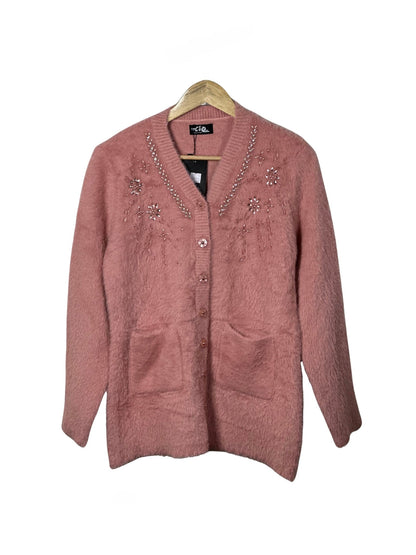 Cozy&Drape pink fuzzy full sleeve cardigan sweater with beaded floral embellishments and front pockets on a hanger