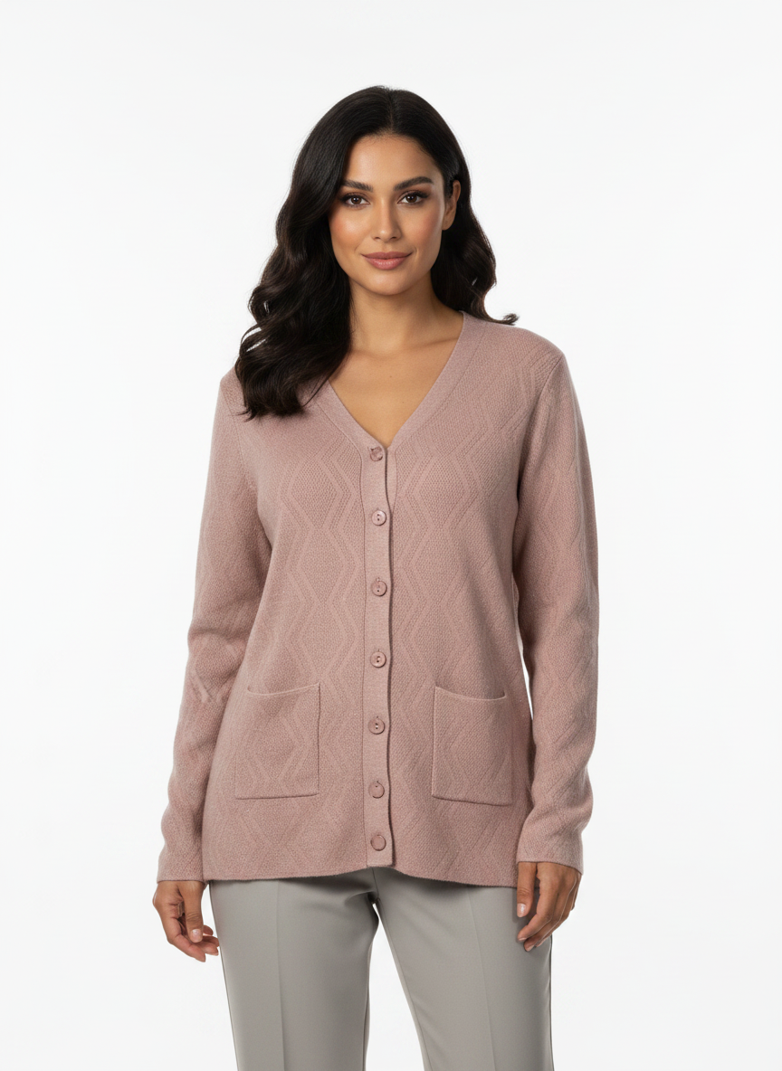 Model wearing a Cozy&Drape dusty pink V-neck knit cardigan with a button-front closure and two front pockets.