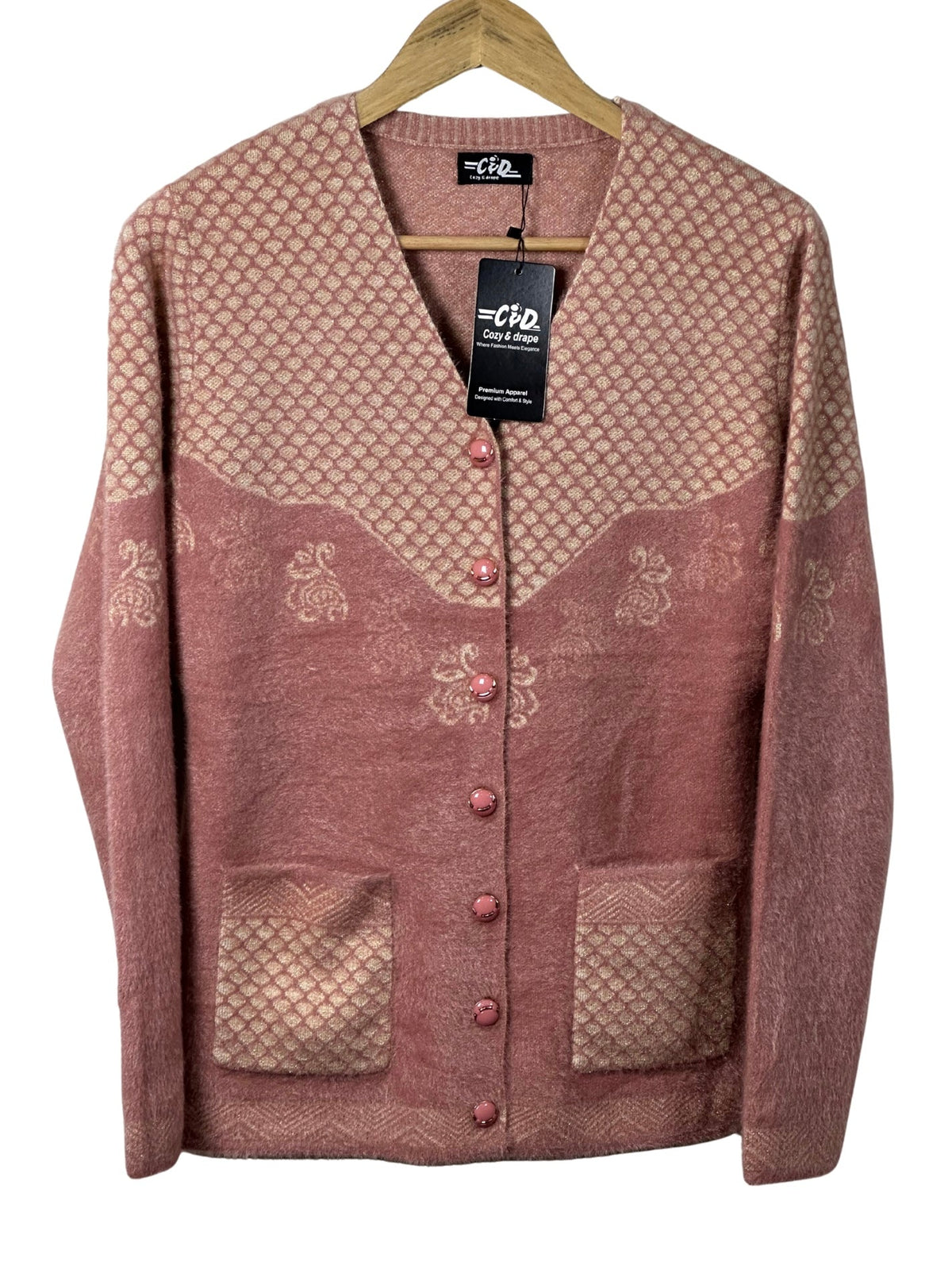 Cozy&Drape pink full sleeve cardigan sweater with textured geometric patterns, front buttons, and two pockets.