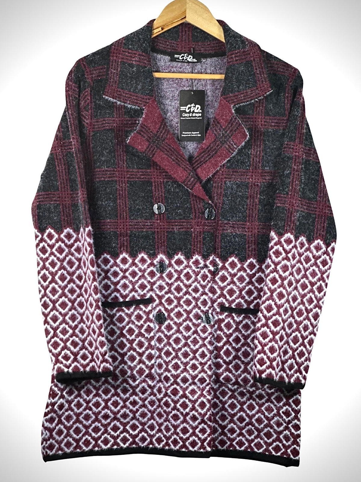 Cozy&Drape long cardigan sweater coat featuring a burgundy and black plaid top with a geometric diamond pattern base.