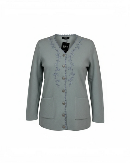 Cozy&Drape sage green button-up cardigan featuring delicate floral embroidery, full sleeves, and two front pockets.