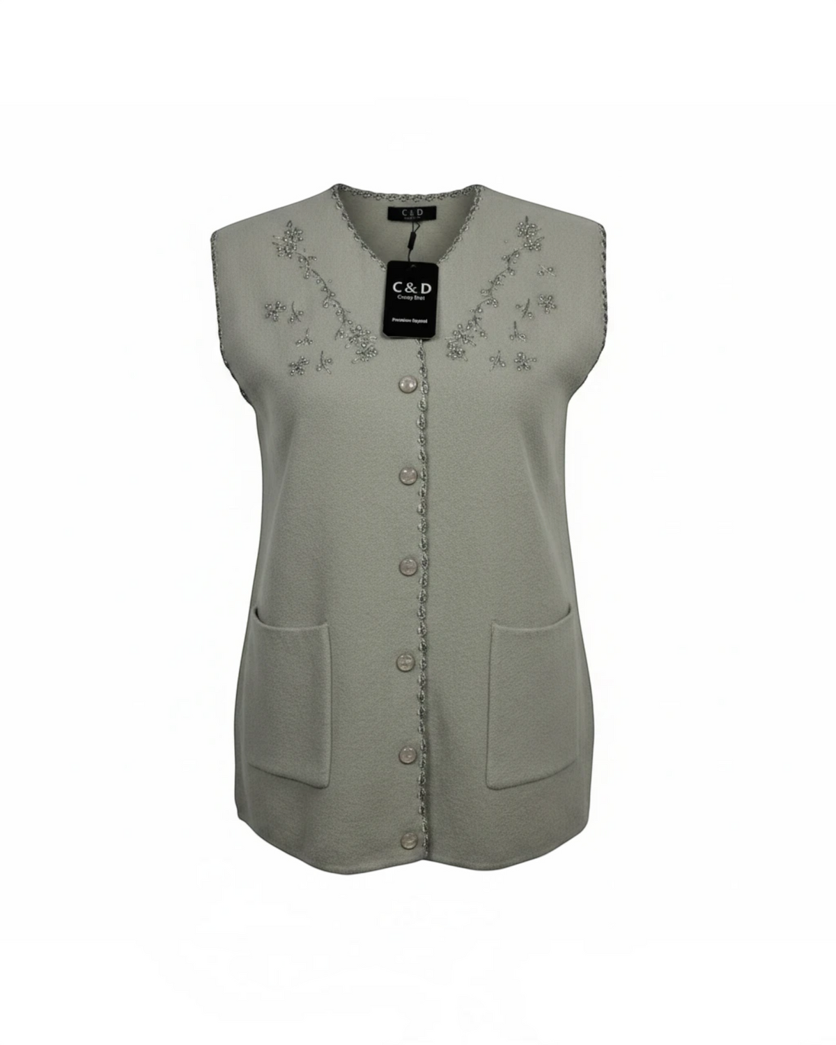 Cozy&Drape sage green sleeveless knit cardigan with V-neckline, floral beadwork, button front, and patch pockets.