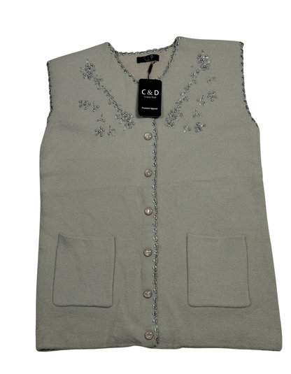 Cozy&Drape sleeveless wool cardigan in sage green with front pockets and delicate floral beadwork embroidery