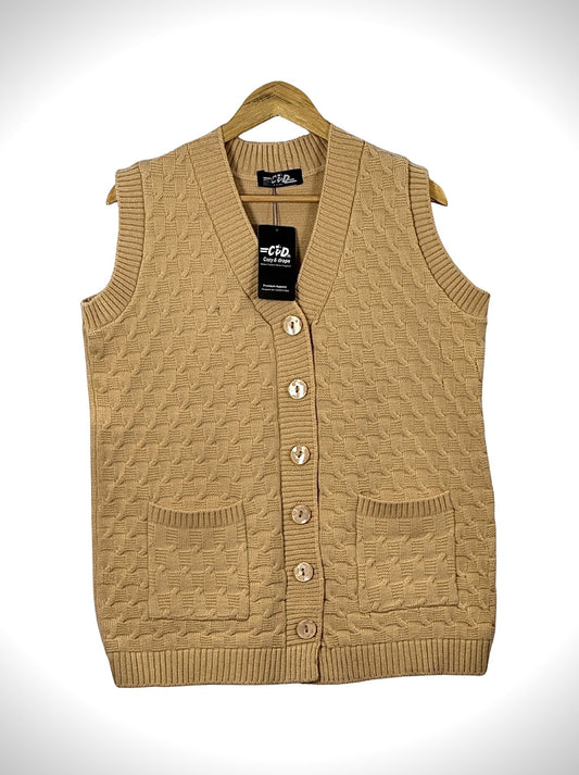Cozy&Drape sleeveless cardigan sweater in beige with a textured cable knit pattern, front buttons, and two pockets.