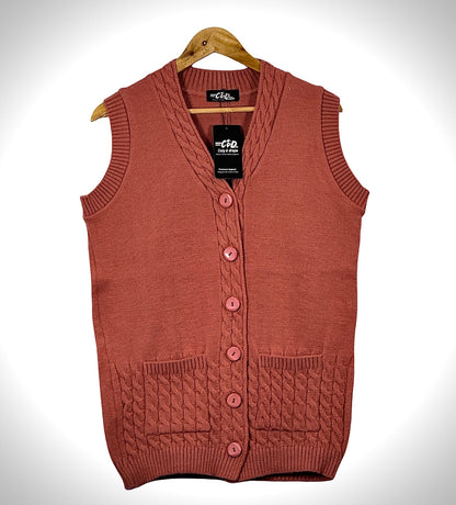 Cozy&Drape sleeveless cardigan sweater in dusty rose with a button-front closure and cable knit pocket details.