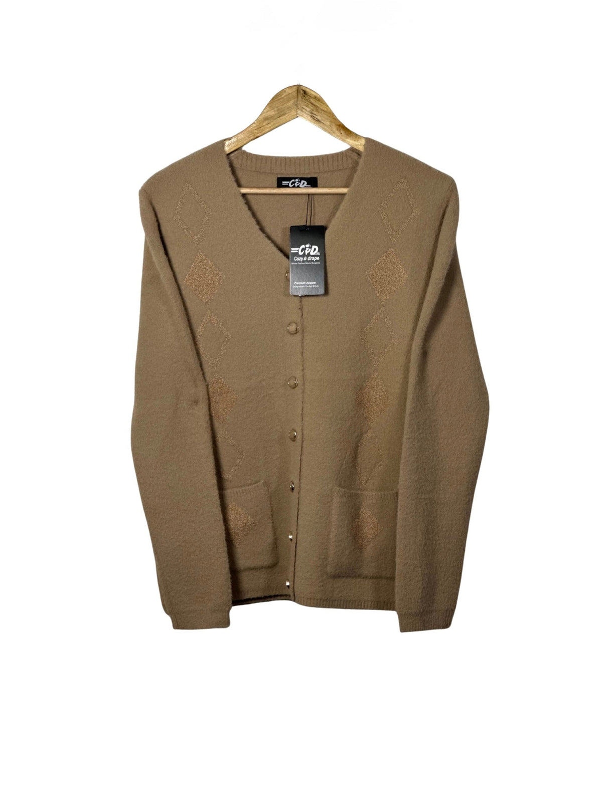 Cozy&Drape tan v-neck cardigan sweater with diamond pattern, front buttons, and pockets on a wooden hanger