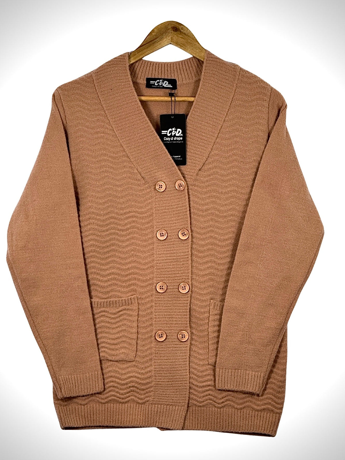 Cozy&Drape long cardigan sweater in tan with a textured wave pattern, front buttons, and two patch pockets.